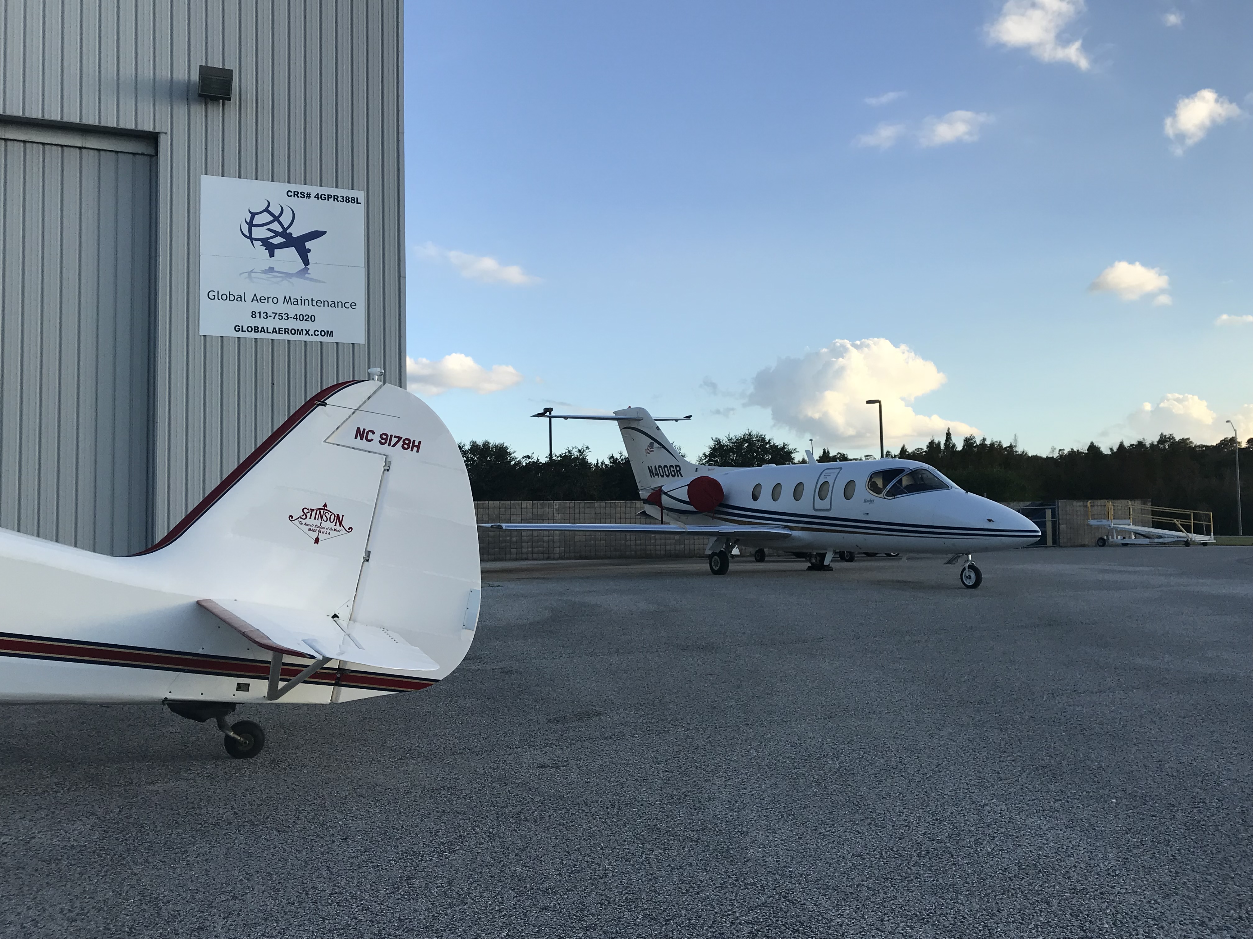 Global Aero Maintenance hangar and aircraft at KVDF
