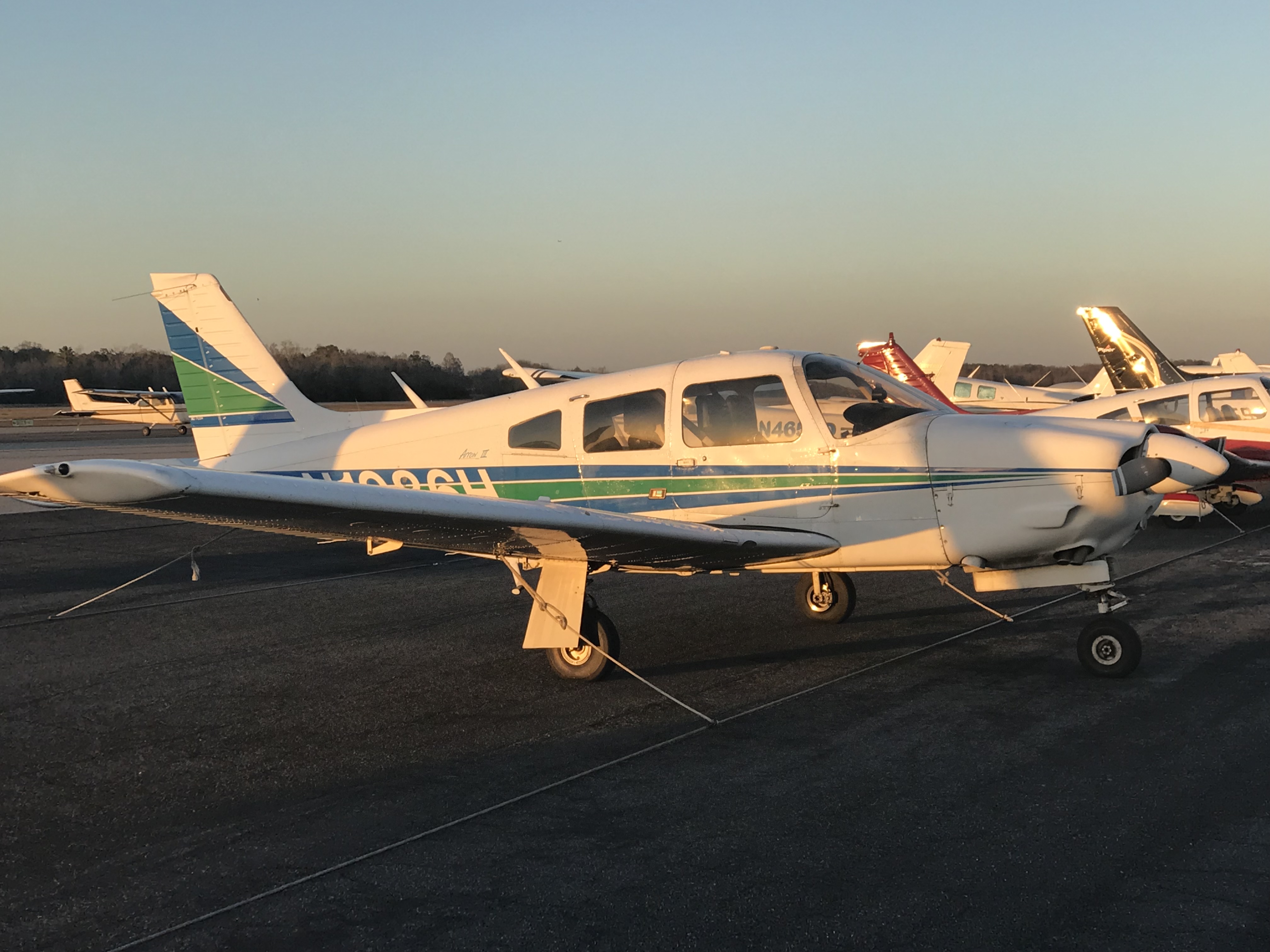 Piper Archer aircraft at golden hour
